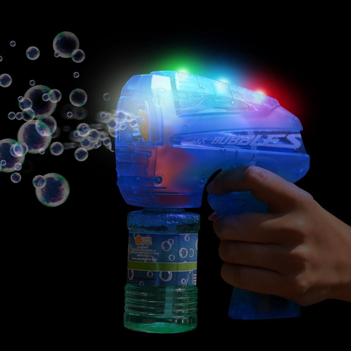 Toy Maxx bubble gun with colorful lights and bubbles on a dark background