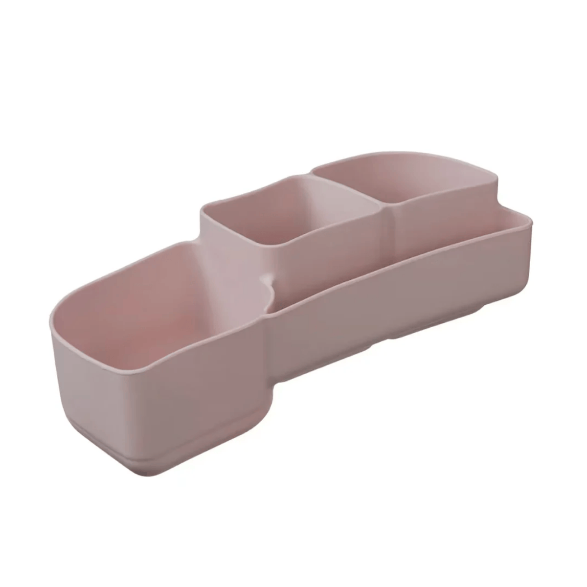 Pink plastic organizer with compartments on a white background