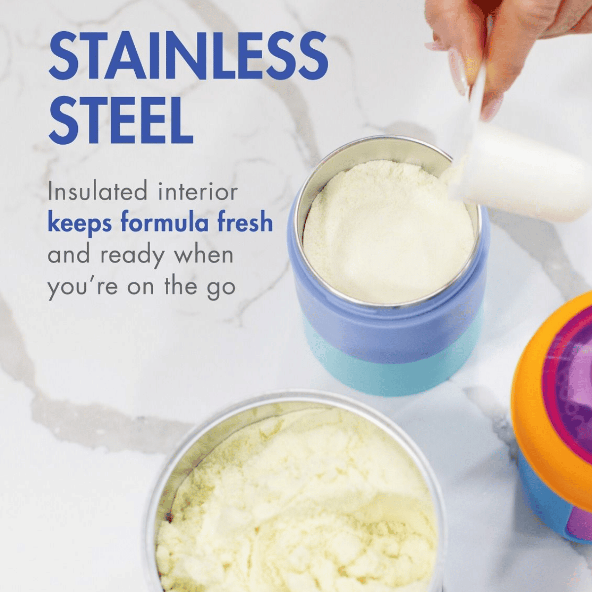 A stainless steel travel container with a blue and light blue insulated interior, shown with formula powder inside and a hand pouring more powder. Large text reads 'STAINLESS STEEL' and 'Insulated interior keeps formula fresh and ready when you're on the go.