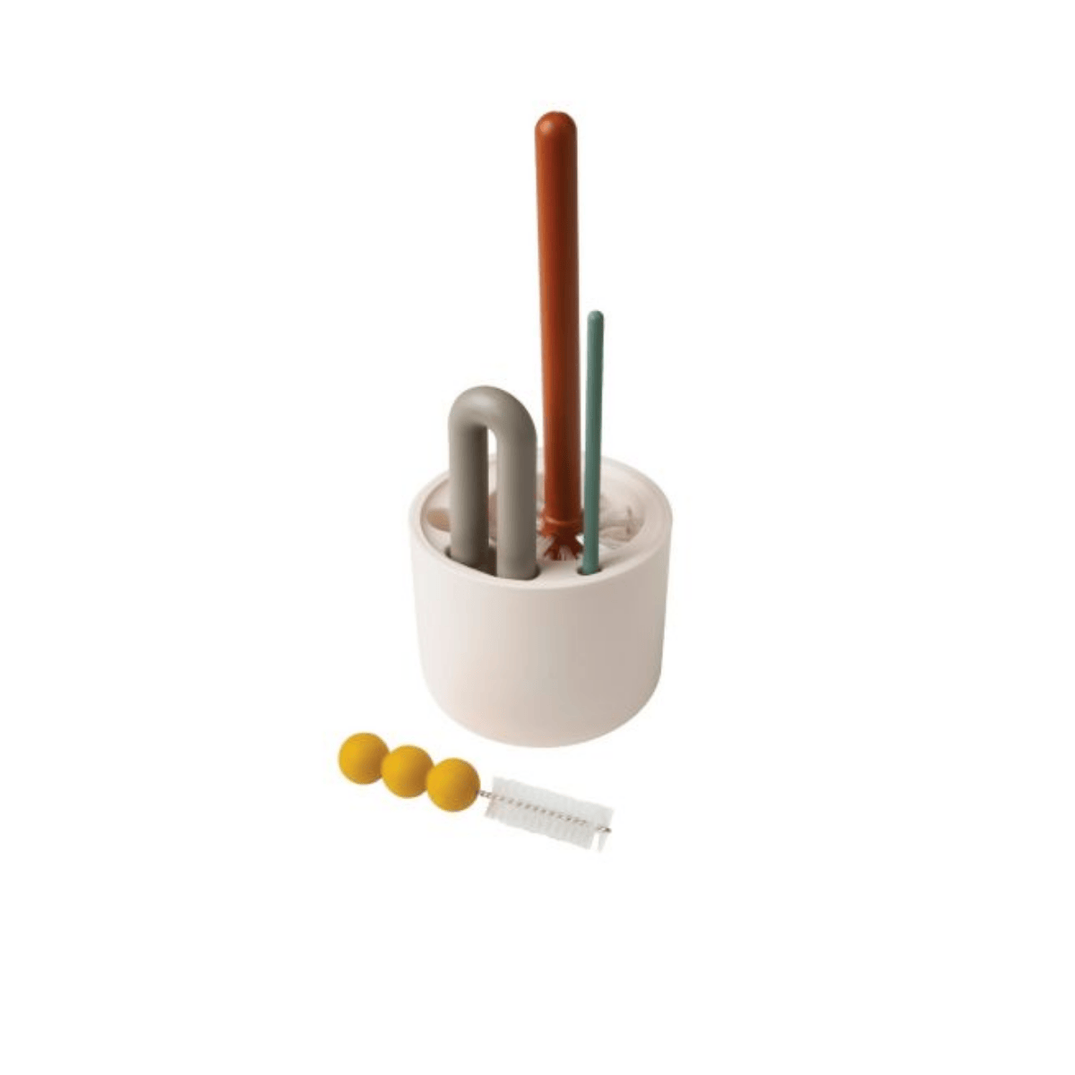 Ceramic holder with three bottle brushes and a yellow brush on a white background