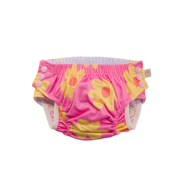 Pink diaper with yellow floral patterns on a white background