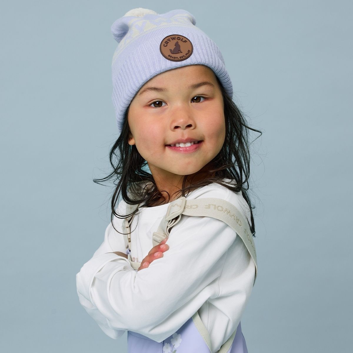 A girl wearing the Periwinkle coloured beanie.