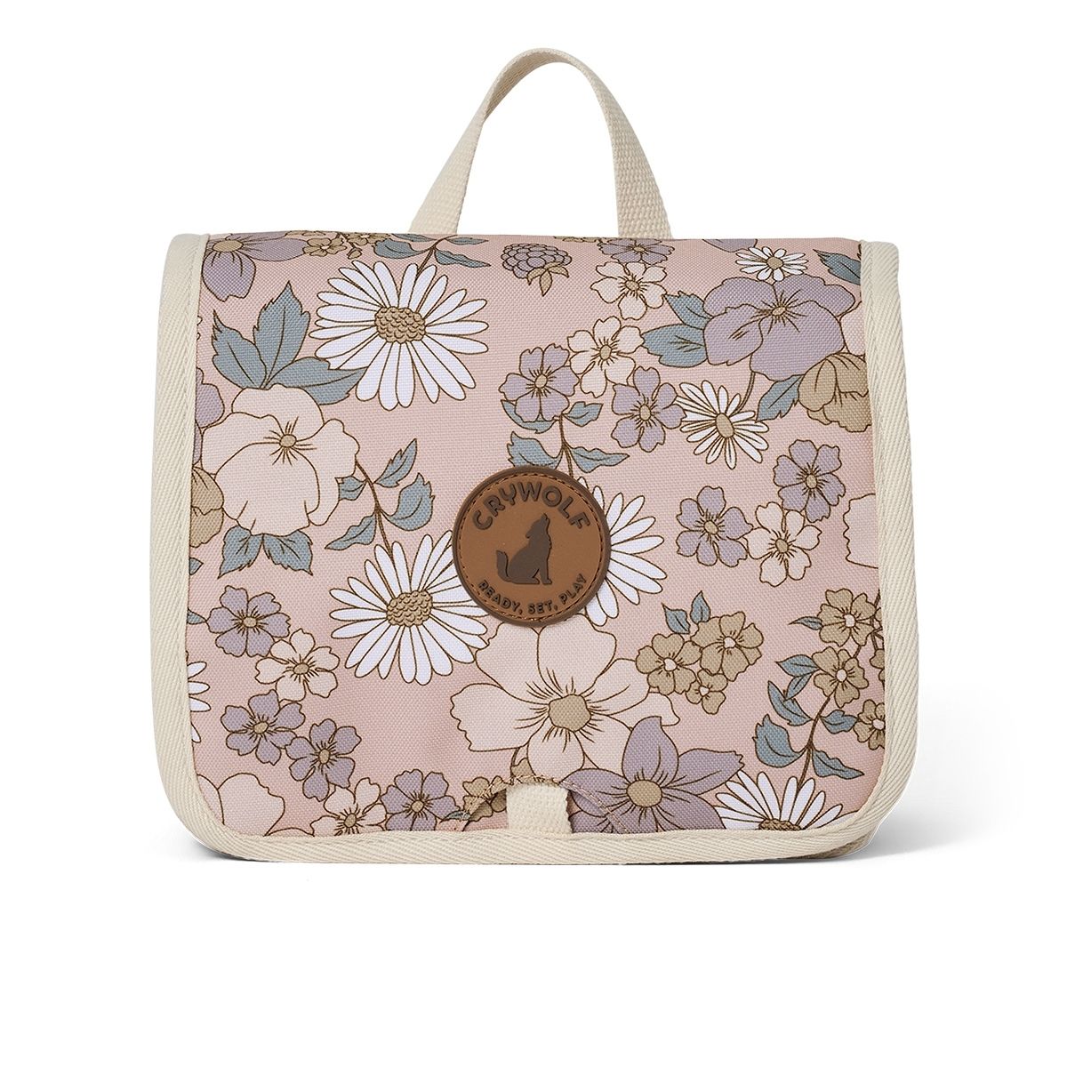 A hanging toiletry bag with a pink flower design for kids to take away on holiday or to keep their bathroom organised.