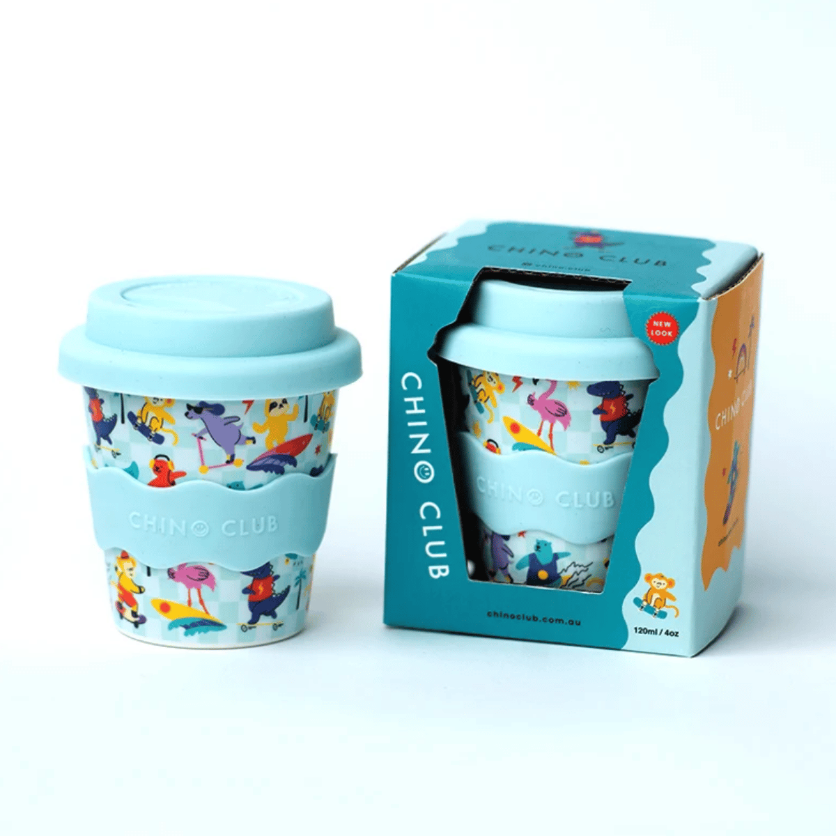 A reusable travel tumbler with a light blue lid and sleeve, featuring a colorful cartoon flamingo print, shown next to its teal and white Chino Club branded packaging box on a clean white background.