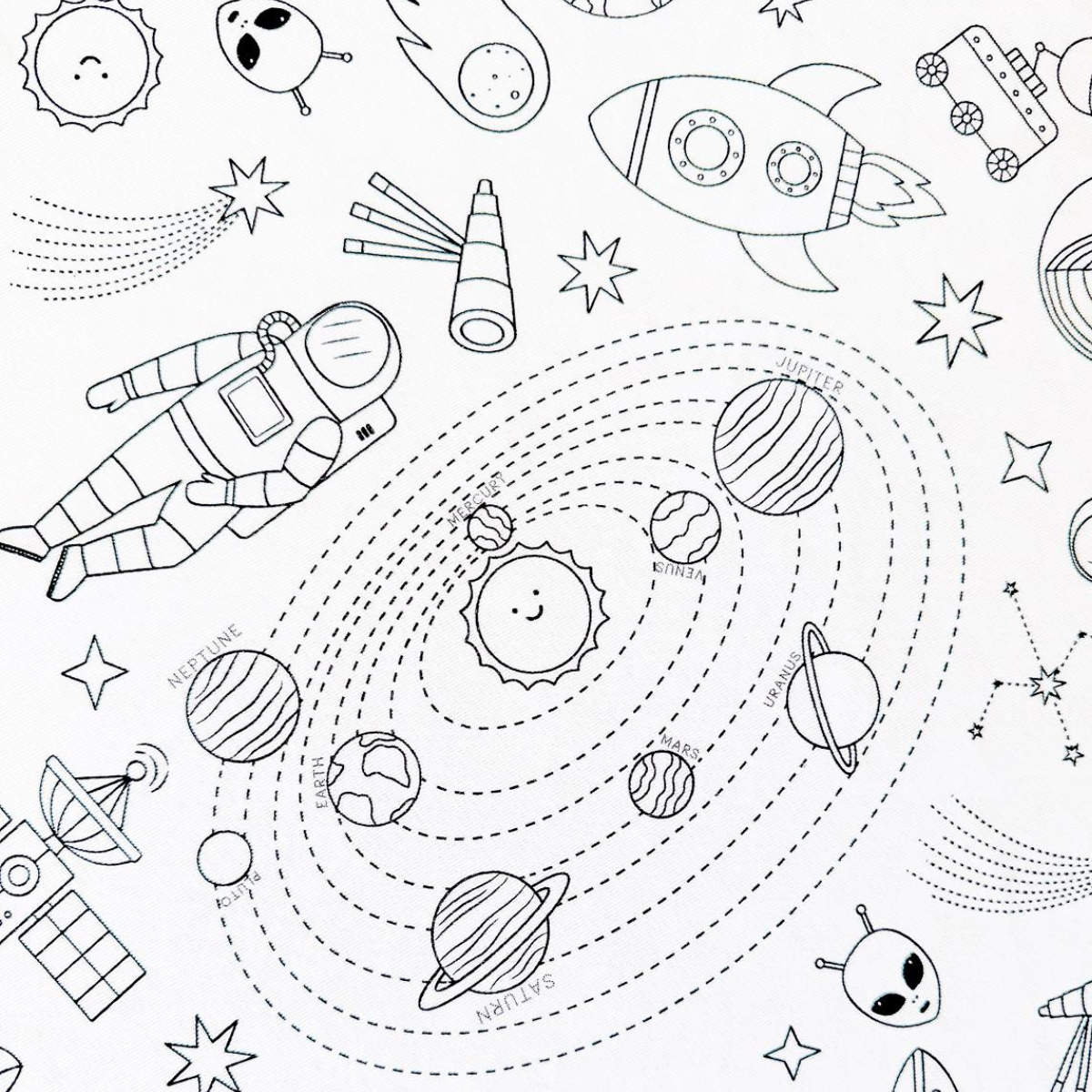 Coloring table cloth  with space-themed illustrations including planets, astronauts, and rockets.