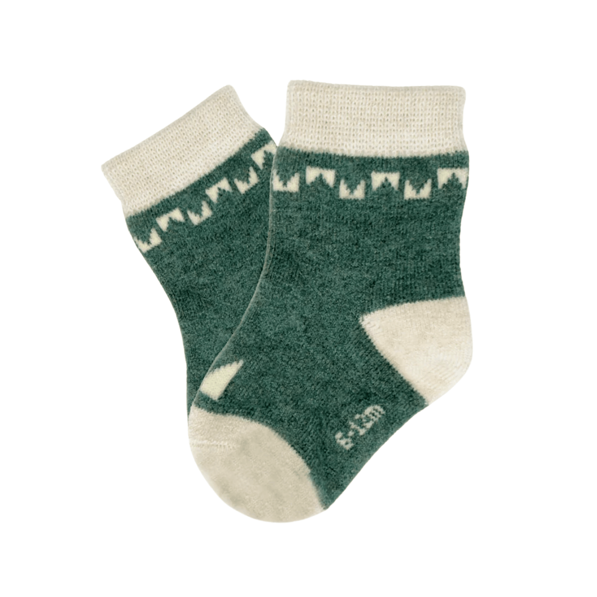 Green socks with white patterns on a white background