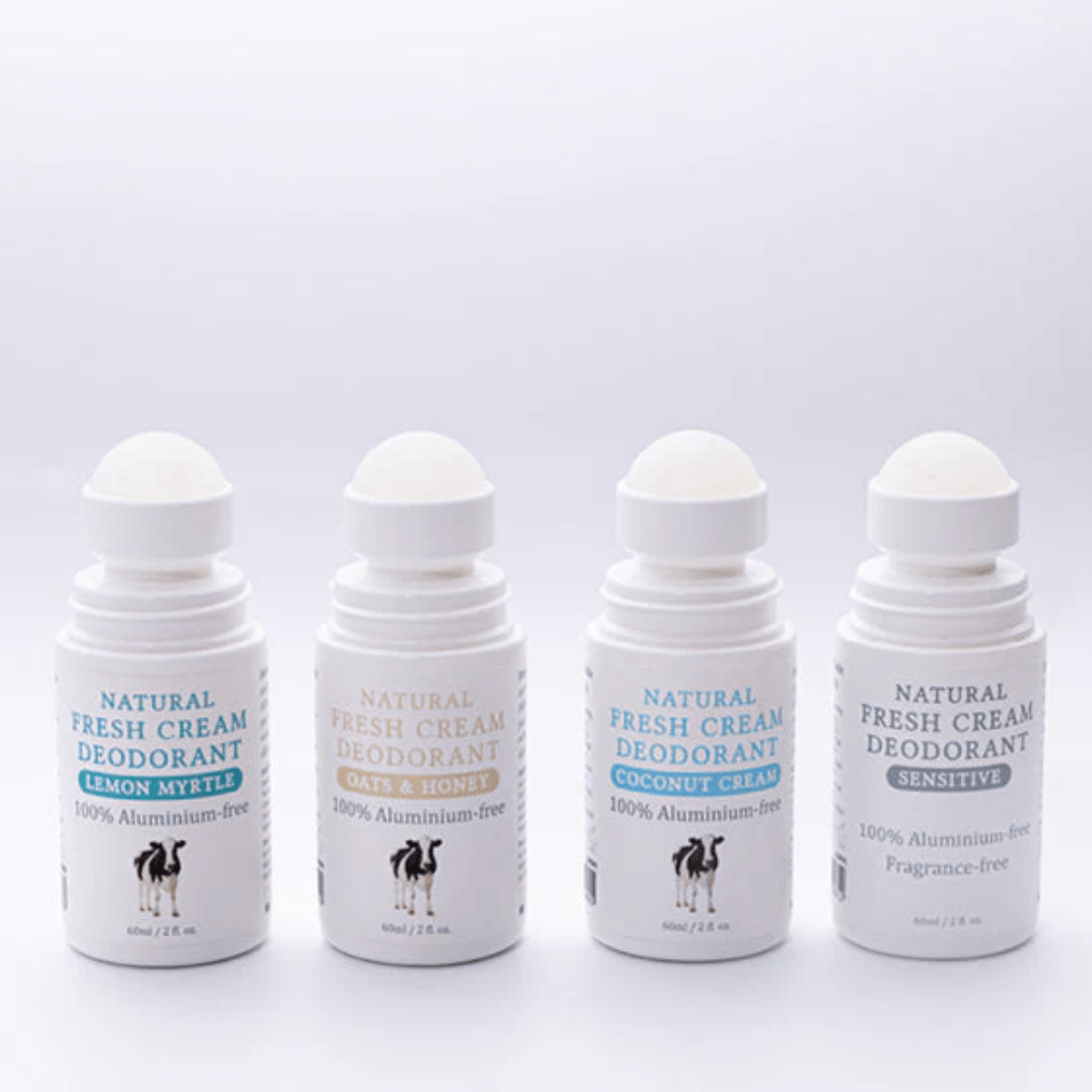 Four bottles of natural deodorant on a white background