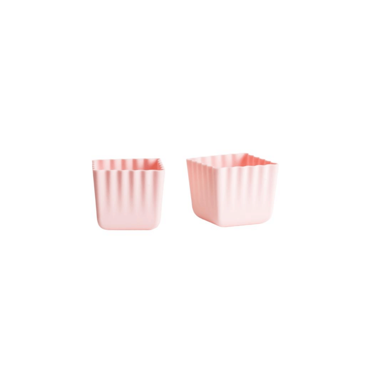 Two small square pink containers with vertical fluted sides, shown on a plain white background.