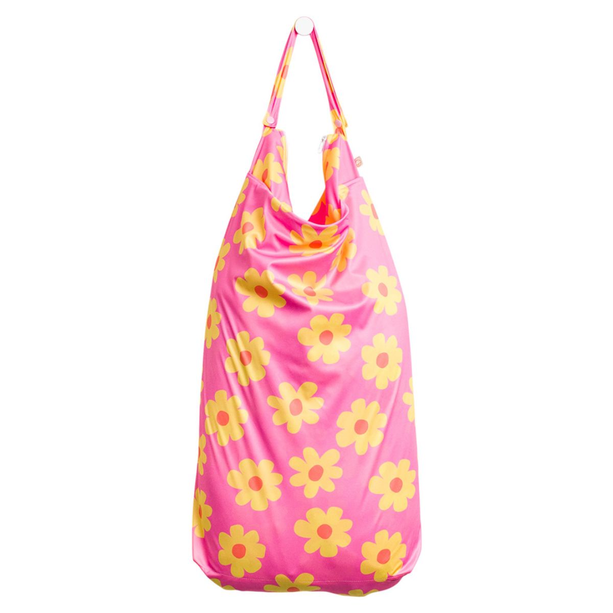 Pink reusable shopping bag with yellow floral pattern on a white background