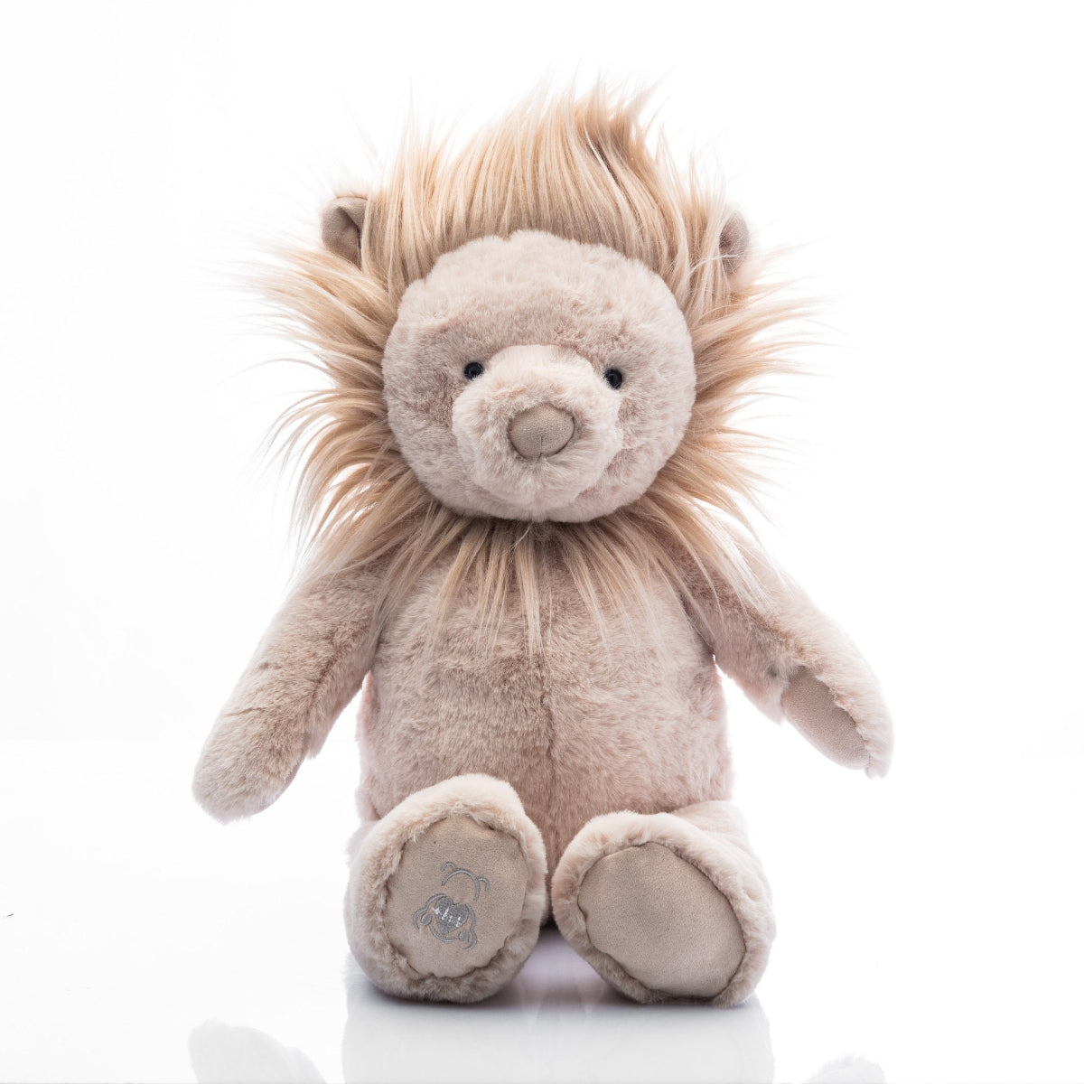Plush lion toy. Has heart that records a short message or your babies heartbeat while in utero.