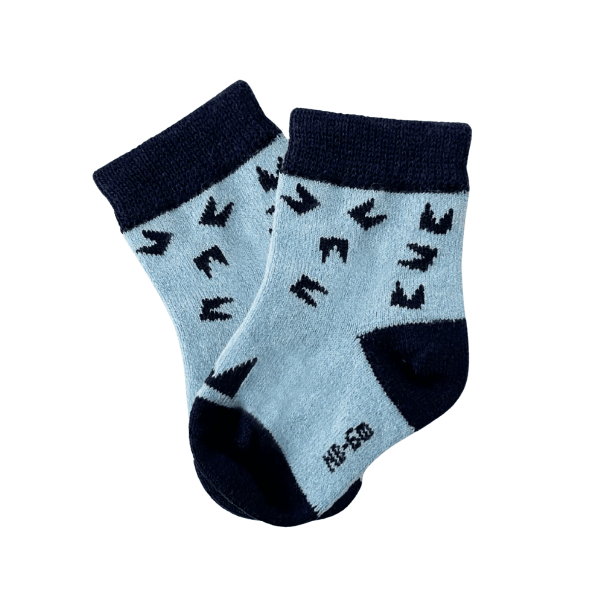 Pair of baby socks with black bird pattern on a light blue background