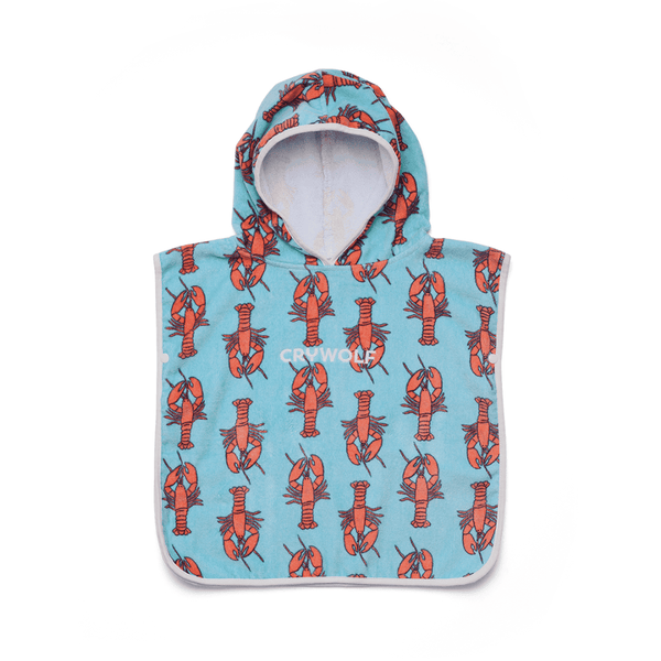A baby hooded towel with red lobsters on a plain whitebackground.