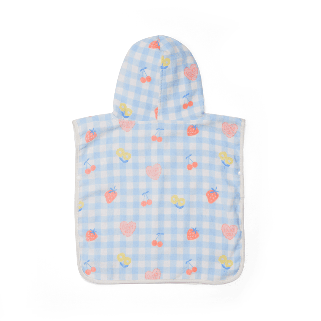 The back of a baby hooded towel with fruits on a plain white background.