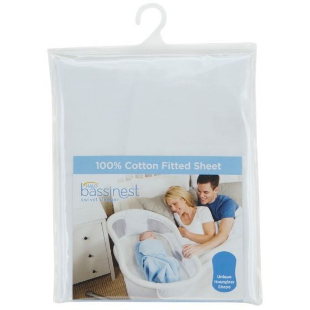 A fitted white cotton sheet made to fit an hourglass bassinet shape.