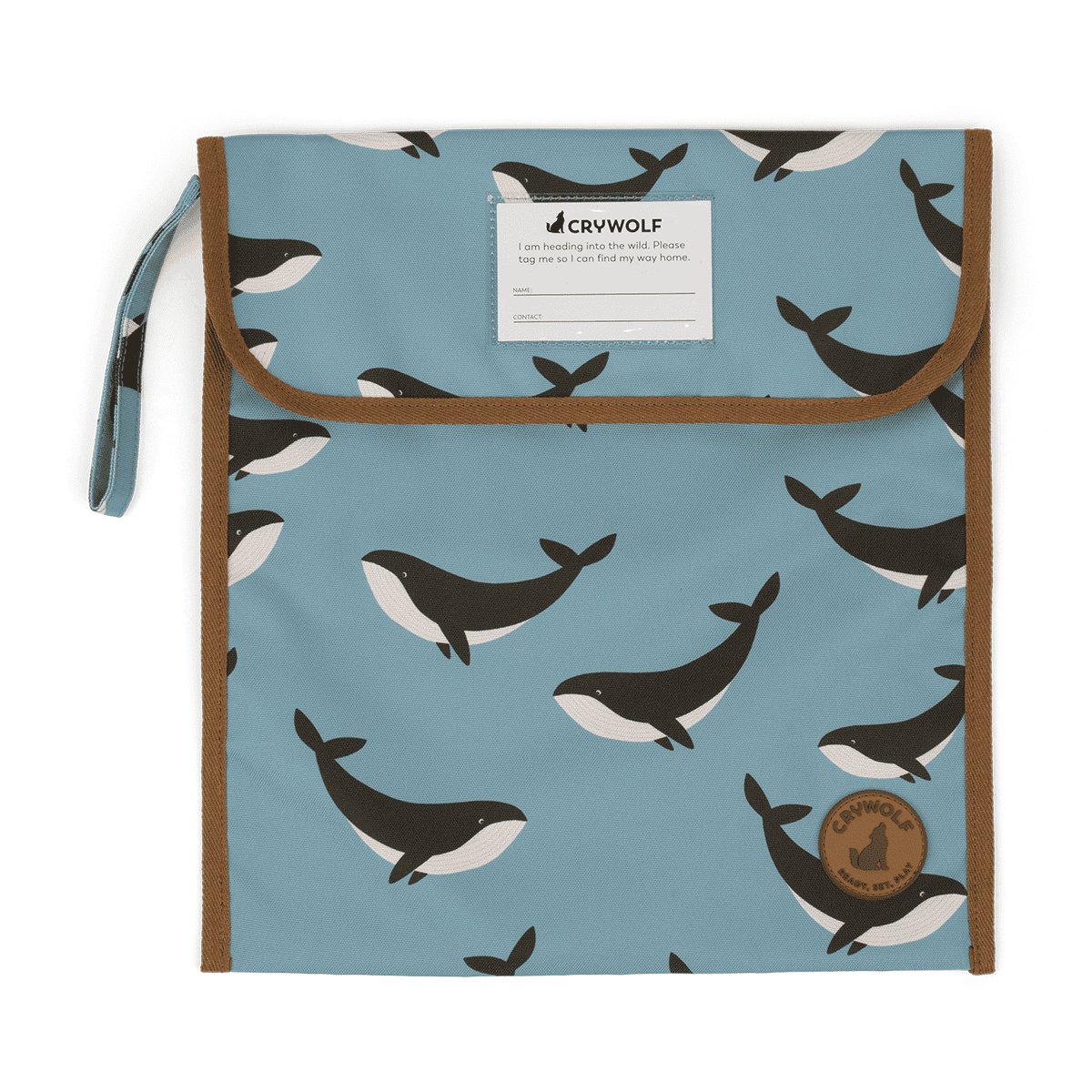 A whale printed book bag for kids books on a plain white background.