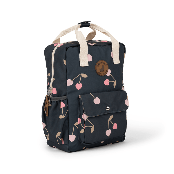 Dark blue backpack with light pink and true pink loveharts that look like cherries