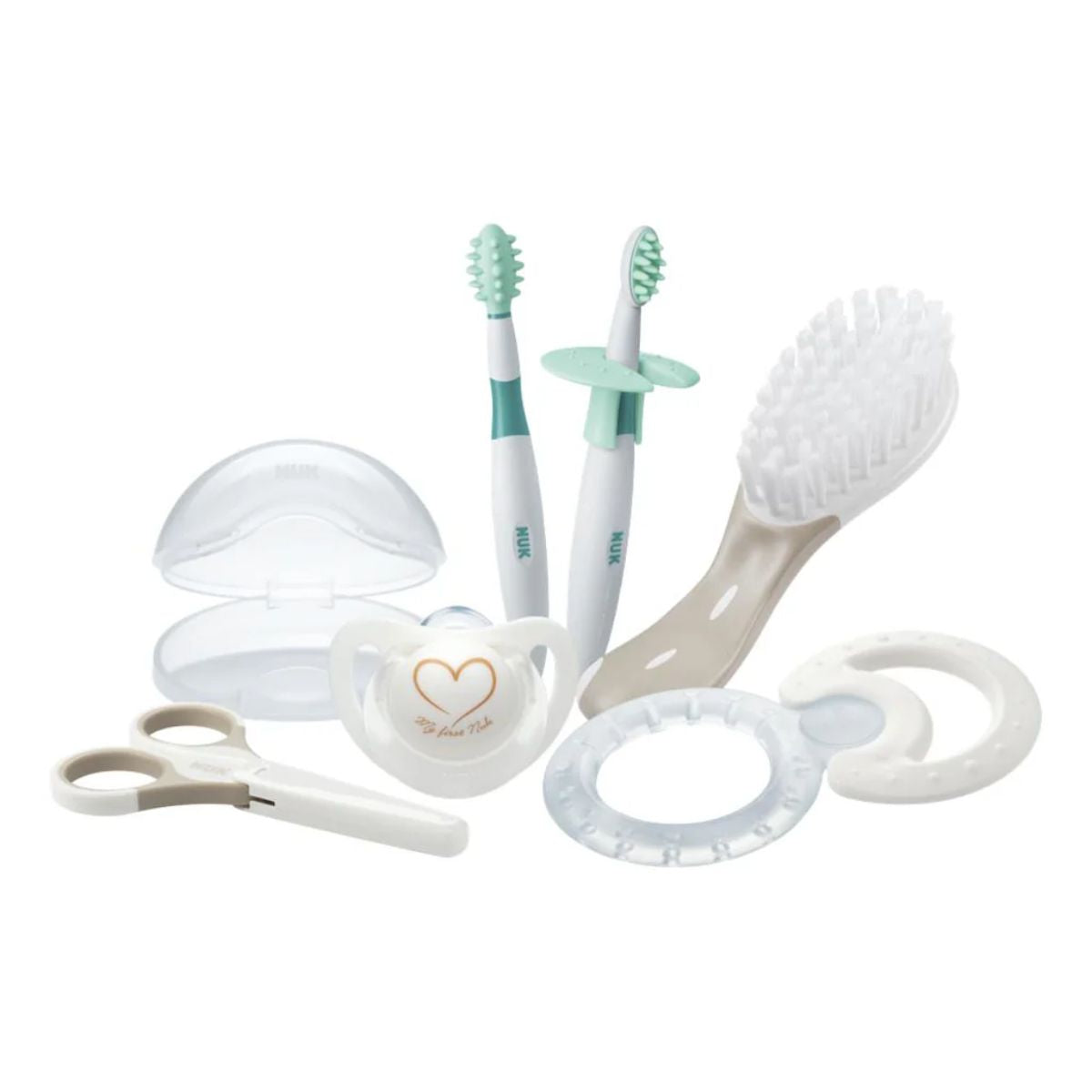 A newborn starter kit containing a starter toothbrush, hair brush, teether, baby scissors and a soother.