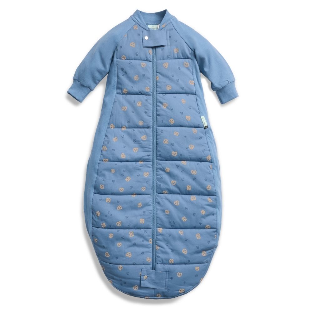 A premium, silky-smooth, wider-fit sleeping bag for infants aged 8 months+ who are sleeping arms out. For Infants who are rolling and sitting, and toddlers and preschoolers who still prefer to wear a Bag for sleep over a Suit. In the colourway petit pretzel.