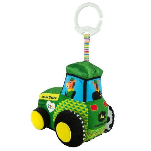 A plush clip on tractor to go on bag and prams to keep babies entertained on the go.